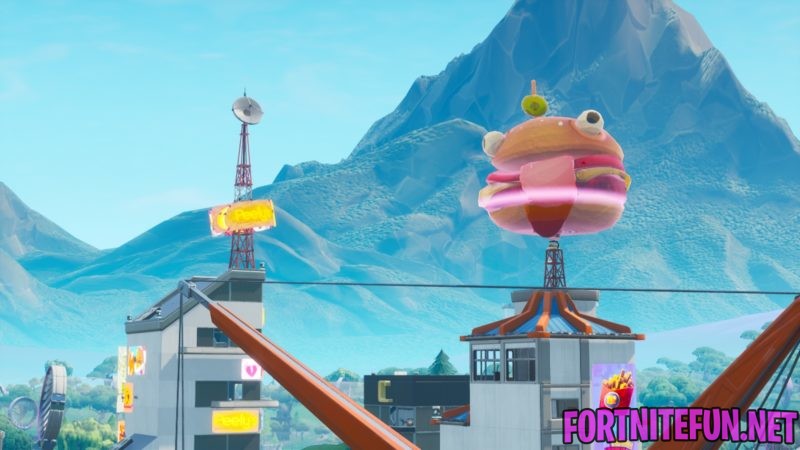 Dance inside holographic Tomato and Durrr Burger heads in series, and then on top of a giant Dumpling head 
